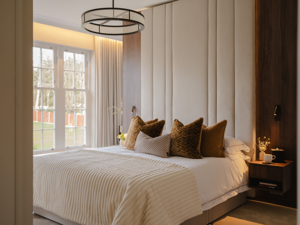 Inspiration for a modern master bedroom in West Midlands.