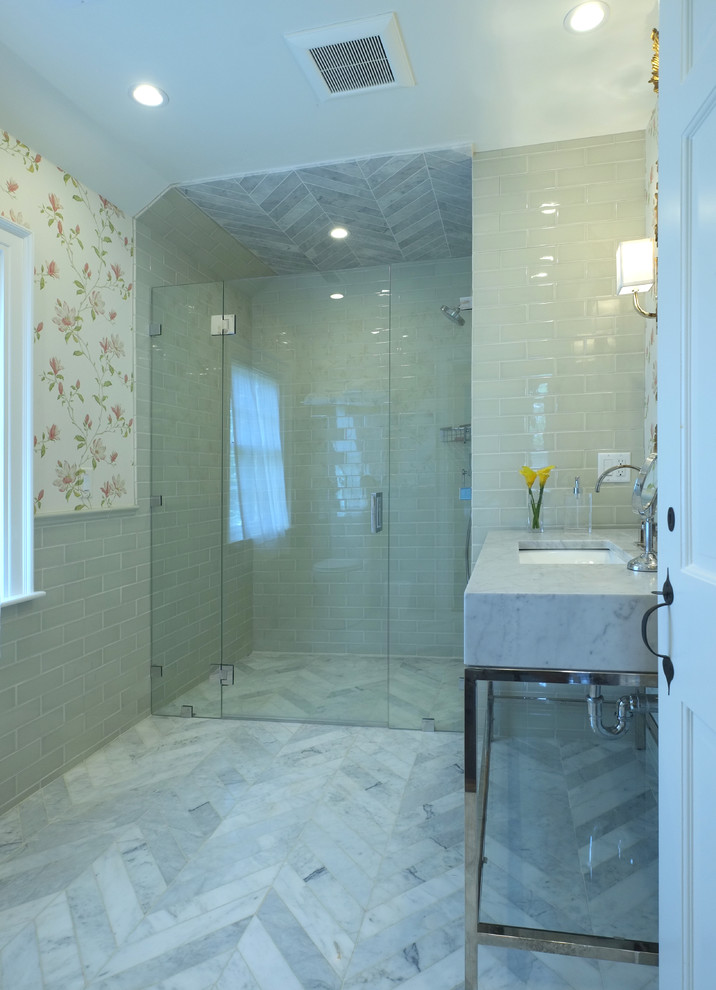 Small contemporary 3/4 bathroom in Boston with a curbless shower, open cabinets, gray tile, stone tile, beige walls, marble floors, an undermount sink and marble benchtops.