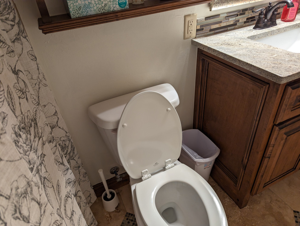 Where to place toilet paper roll holder?