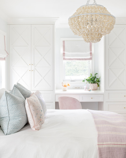 girly coastal bedroom with hanging shell chandelier
