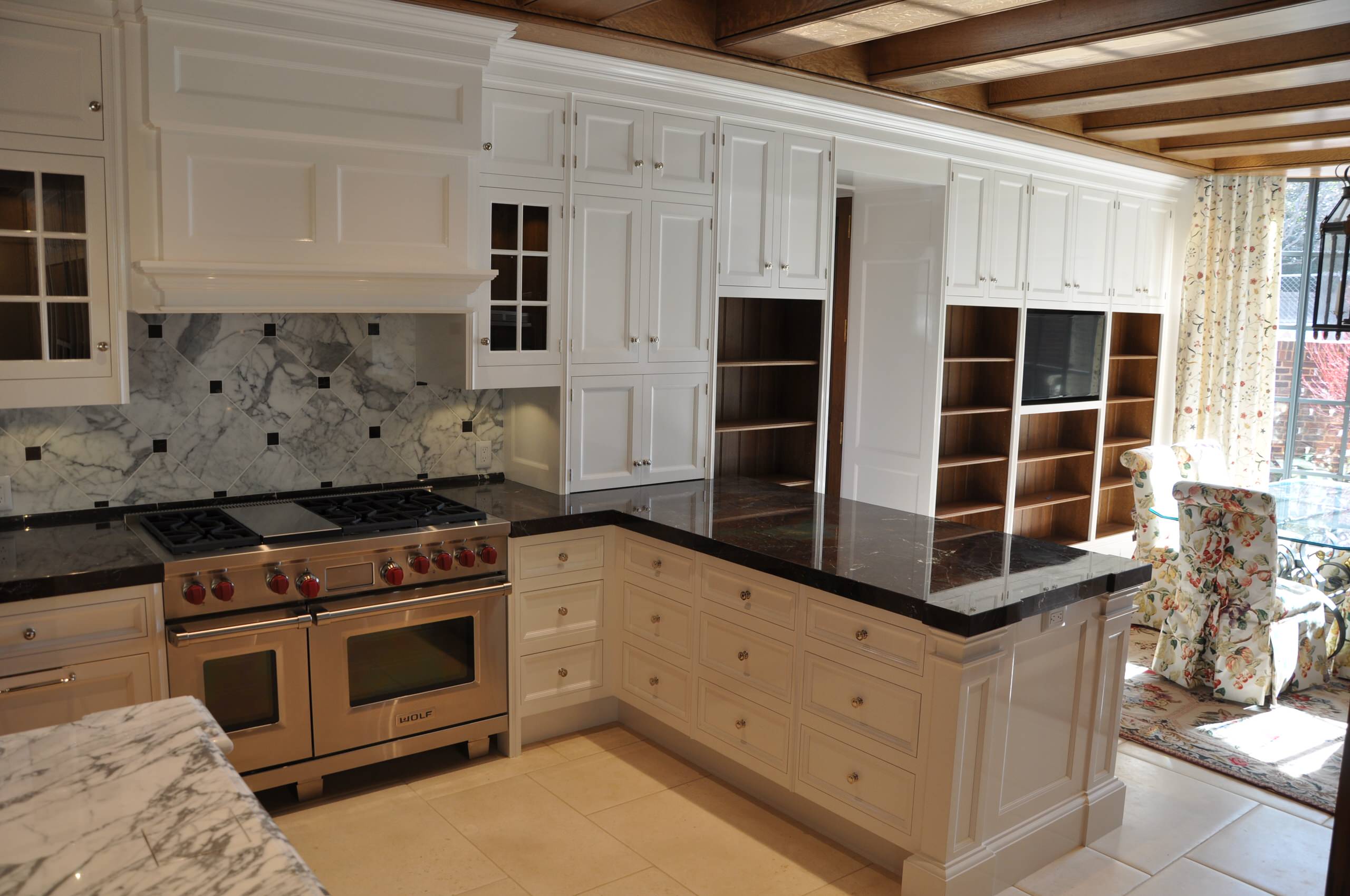 Refectory Kitchen with custom made hardware, hand painted with high gloss paint.