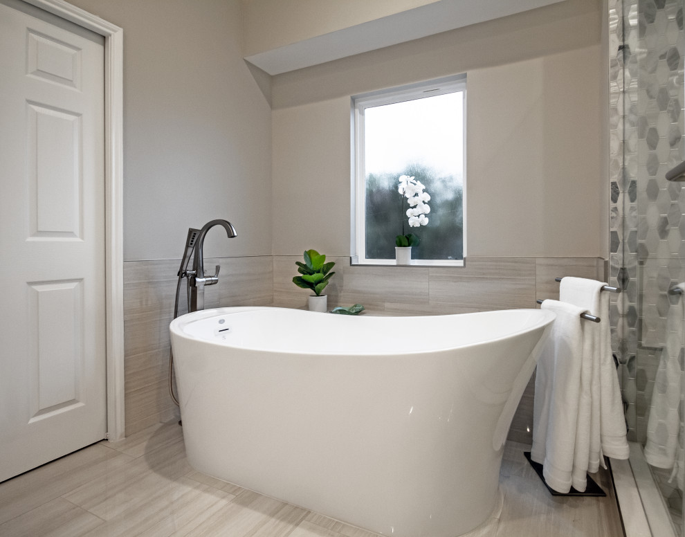 This is an example of a large classic ensuite bathroom in Houston with shaker cabinets, grey cabinets, an alcove shower, multi-coloured tiles, marble tiles, grey walls, porcelain flooring, a submerged sink, engineered stone worktops, white floors, a hinged door, white worktops, double sinks, a built in vanity unit and wainscoting.