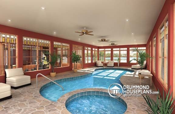 Large contemporary indoor custom-shaped pool in Tampa with a pool house and natural stone pavers.