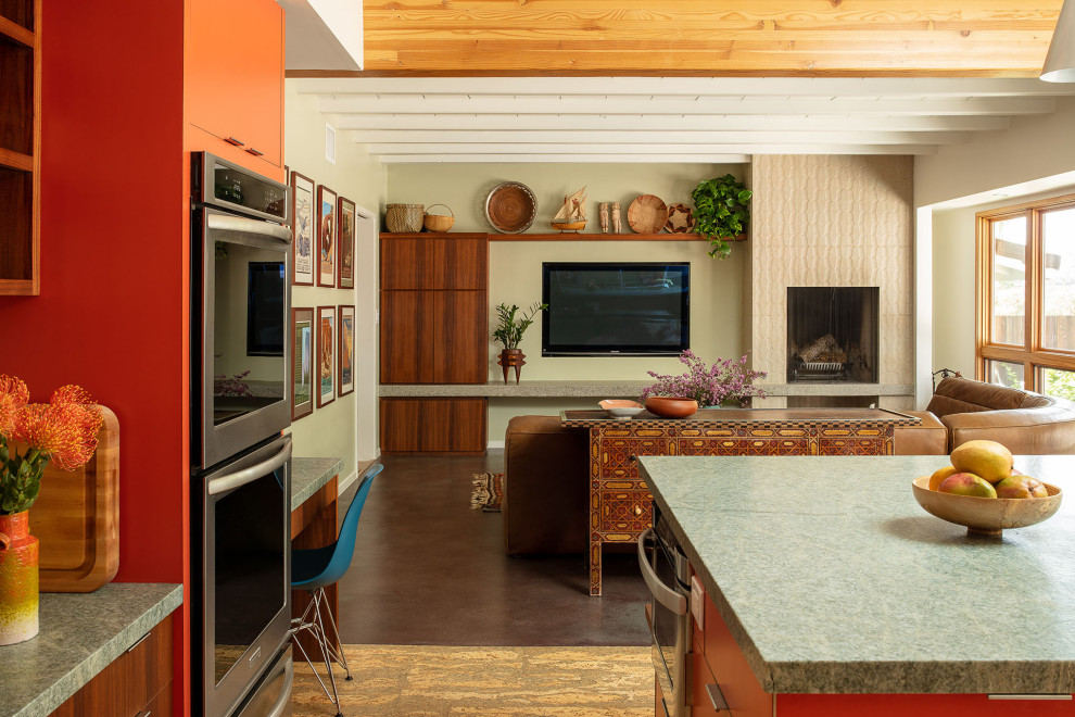 Inspiration for a large midcentury l-shaped eat-in kitchen in Los Angeles with a double-bowl sink, flat-panel cabinets, dark wood cabinets, quartzite benchtops, green splashback, subway tile splashback, stainless steel appliances, cork floors, with island, beige floor, grey benchtop and exposed beam.