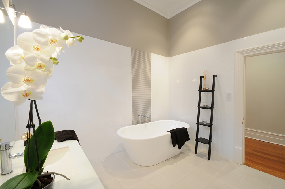 This is an example of a contemporary bathroom in Perth with a freestanding tub.