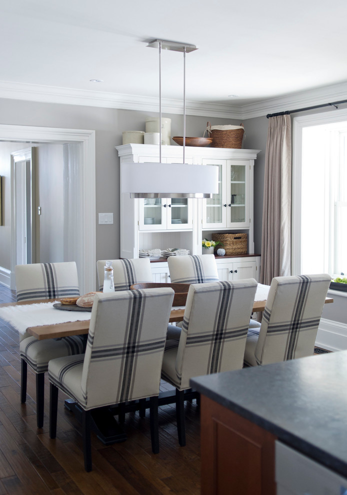 Inspiration for a large country separate dining room in Toronto with grey walls and dark hardwood floors.