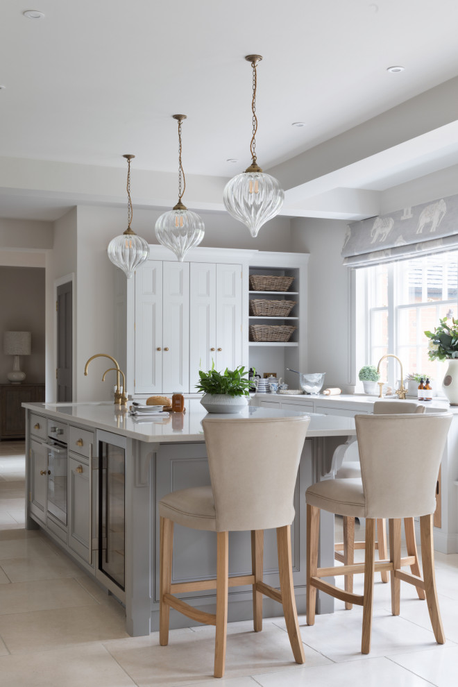 Example of a transitional kitchen design in Kent