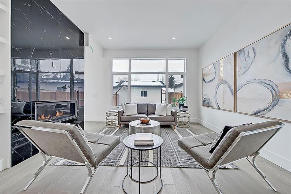 Transitional home design photo in Calgary