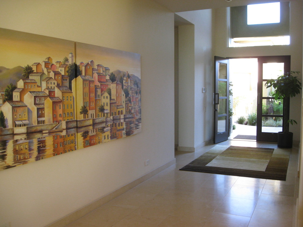 Example of a large transitional ceramic tile and beige floor front door design in Orange County with beige walls and a dark wood front door