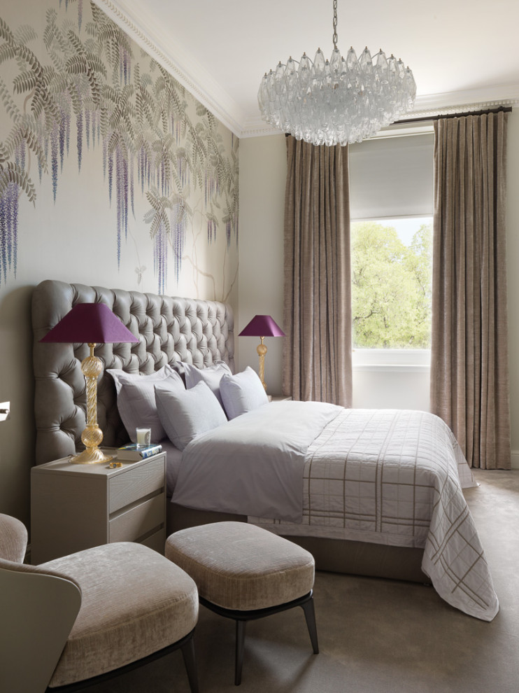 Inspiration for a transitional bedroom in London with beige walls, carpet, beige floor and wallpaper.