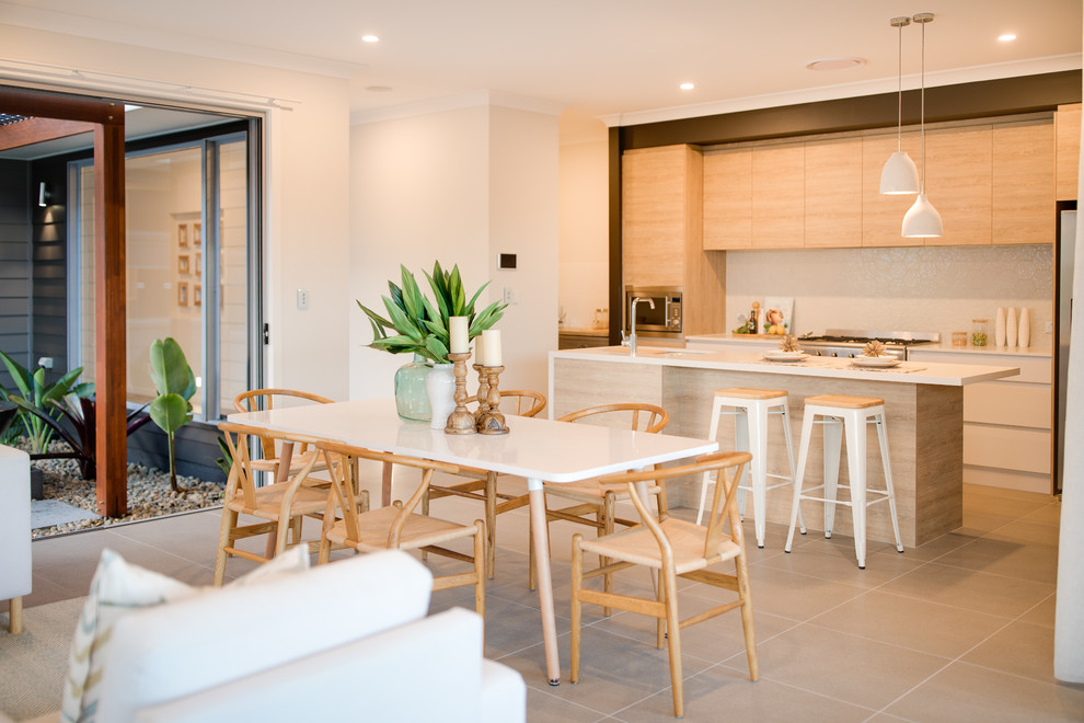 Contemporary open plan dining in Sydney with white walls.