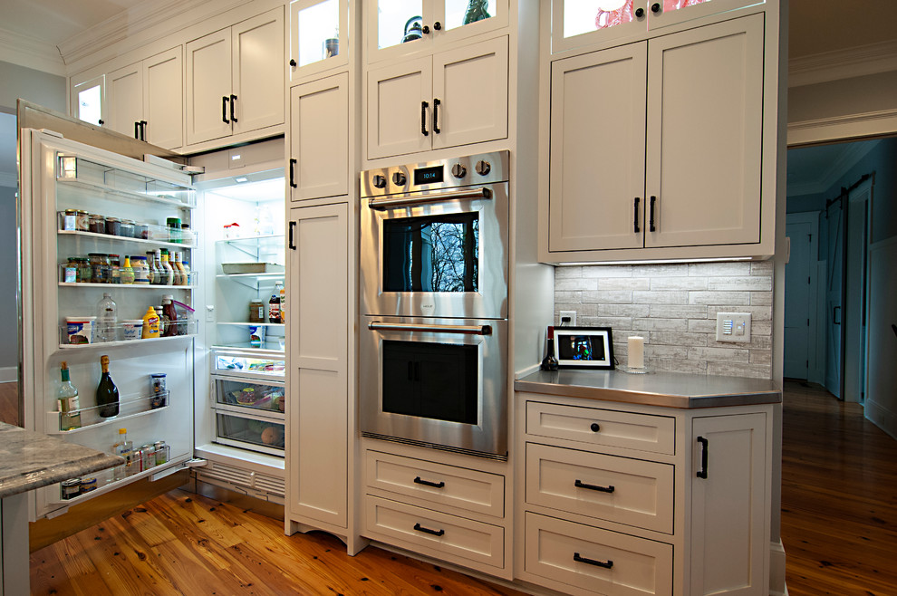 Photo of an arts and crafts kitchen in Charlotte.