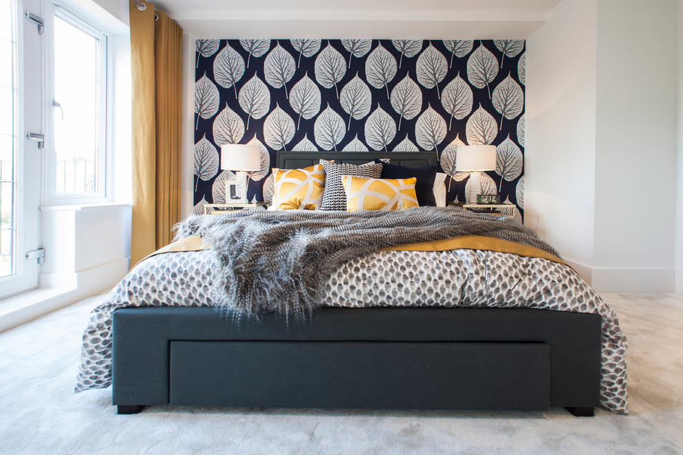Design ideas for a contemporary bedroom in Dorset with white walls and carpet.