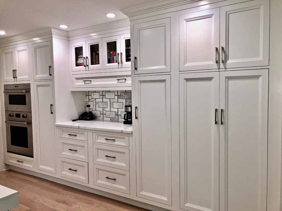 Large transitional eat-in kitchen photo in New York with beaded inset cabinets, gray cabinets, quartz countertops and an island