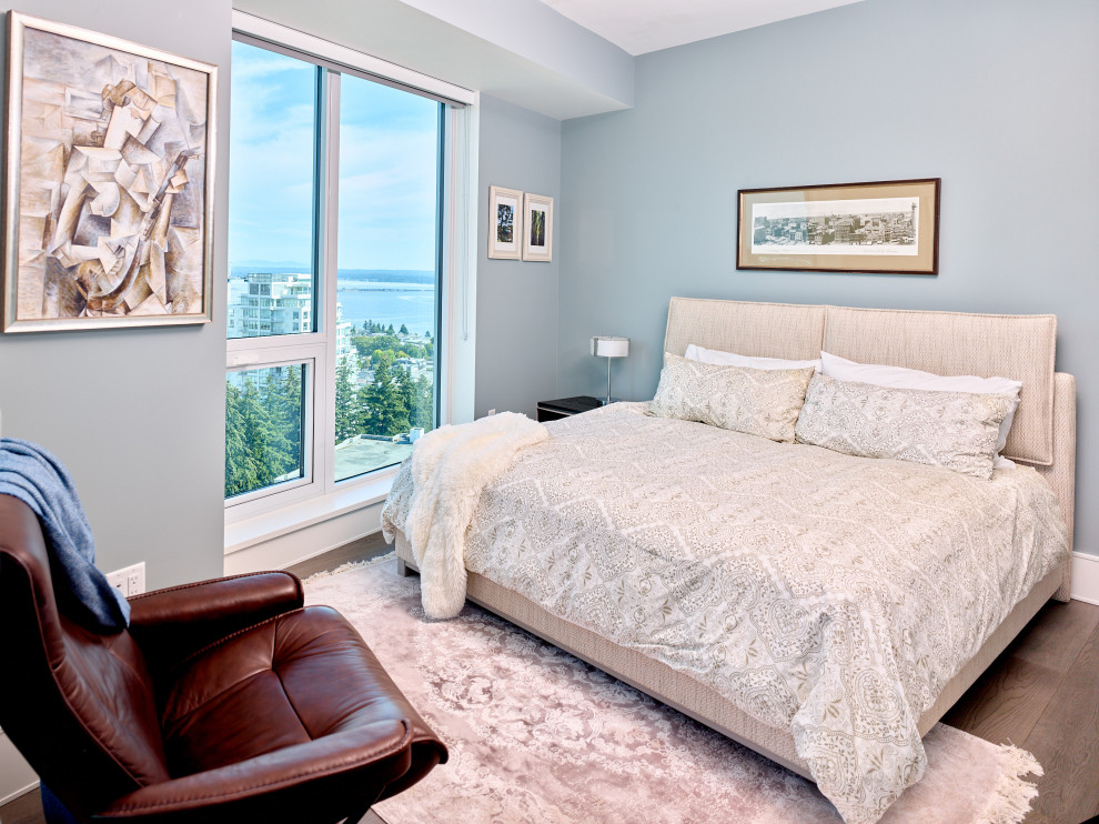 This is an example of a contemporary bedroom in Vancouver.