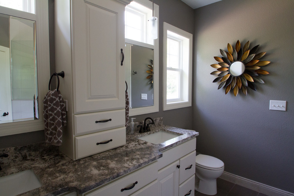 Design ideas for a large traditional master bathroom in Milwaukee with an undermount sink, shaker cabinets, white cabinets, granite benchtops, an open shower, a one-piece toilet, purple walls and ceramic floors.