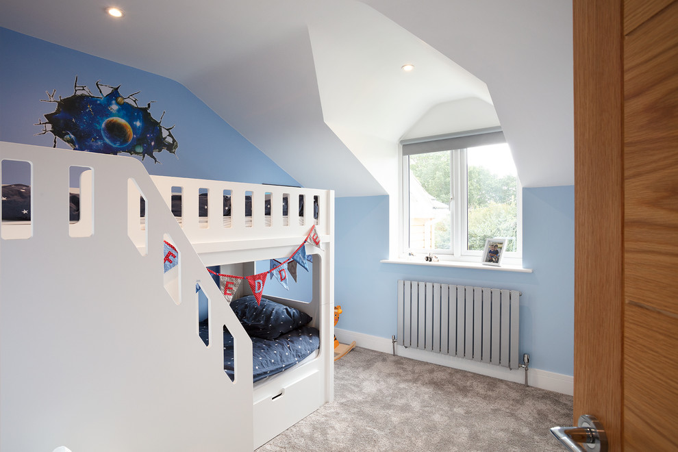Design ideas for a mid-sized contemporary kids' bedroom for kids 4-10 years old and boys in Berkshire with blue walls, carpet and grey floor.
