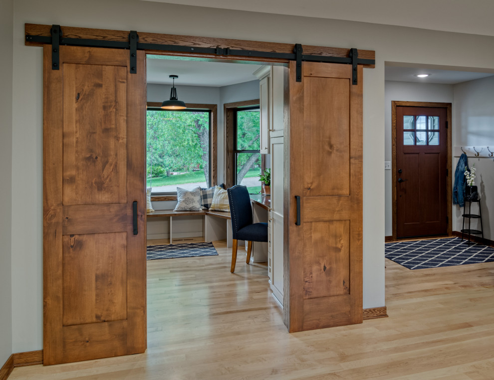 Large transitional u-shaped light wood floor and beige floor eat-in kitchen photo in Minneapolis with a farmhouse sink, shaker cabinets, gray cabinets, quartz countertops, white backsplash, ceramic backsplash, stainless steel appliances, an island and white countertops