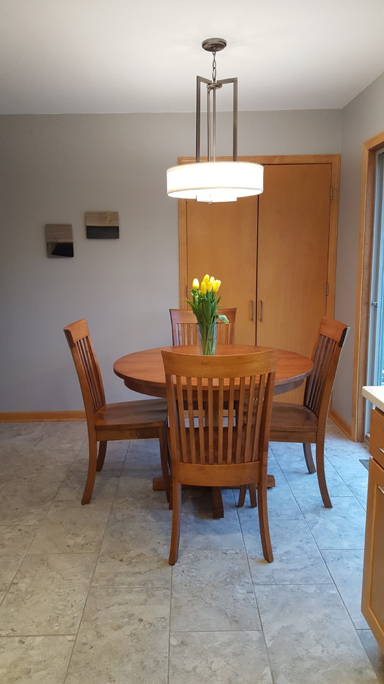 Kitchen/dining room combo - mid-sized transitional l-shaped ceramic tile kitchen/dining room combo idea with an undermount sink, shaker cabinets, light wood cabinets, quartz countertops, gray backsplash, subway tile backsplash, stainless steel appliances and no island
