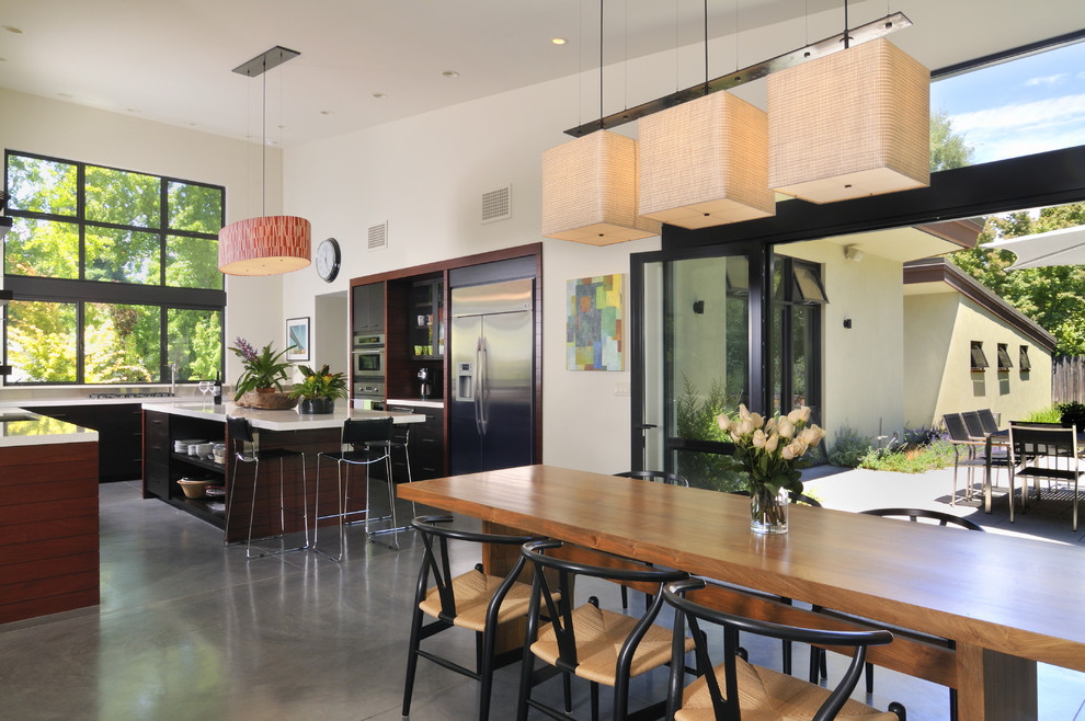 Photo of a modern kitchen/dining combo in San Francisco with white walls.