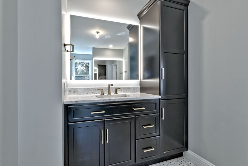 Example of a large transitional master mosaic tile floor, white floor and single-sink alcove shower design in Philadelphia with flat-panel cabinets, black cabinets, gray walls, an undermount sink, quartz countertops, gray countertops and a built-in vanity