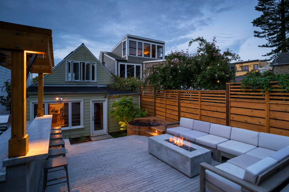 Transitional patio photo in Los Angeles with a fire pit and no cover