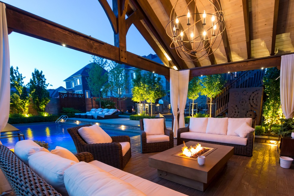 This is an example of a transitional backyard landscaping in Toronto.