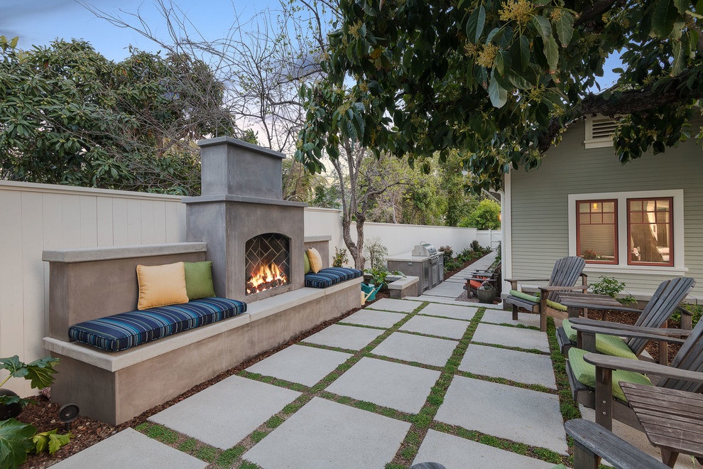 Inspiration for a traditional patio in Los Angeles with with fireplace and no cover.