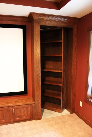 Walk-in closet - mid-sized gender-neutral ceramic tile walk-in closet idea with medium tone wood cabinets