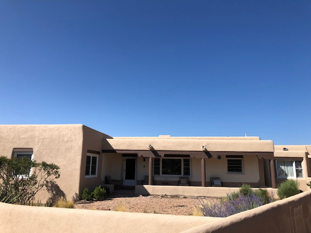 Exterior Facelift: Stucco & Porch Project