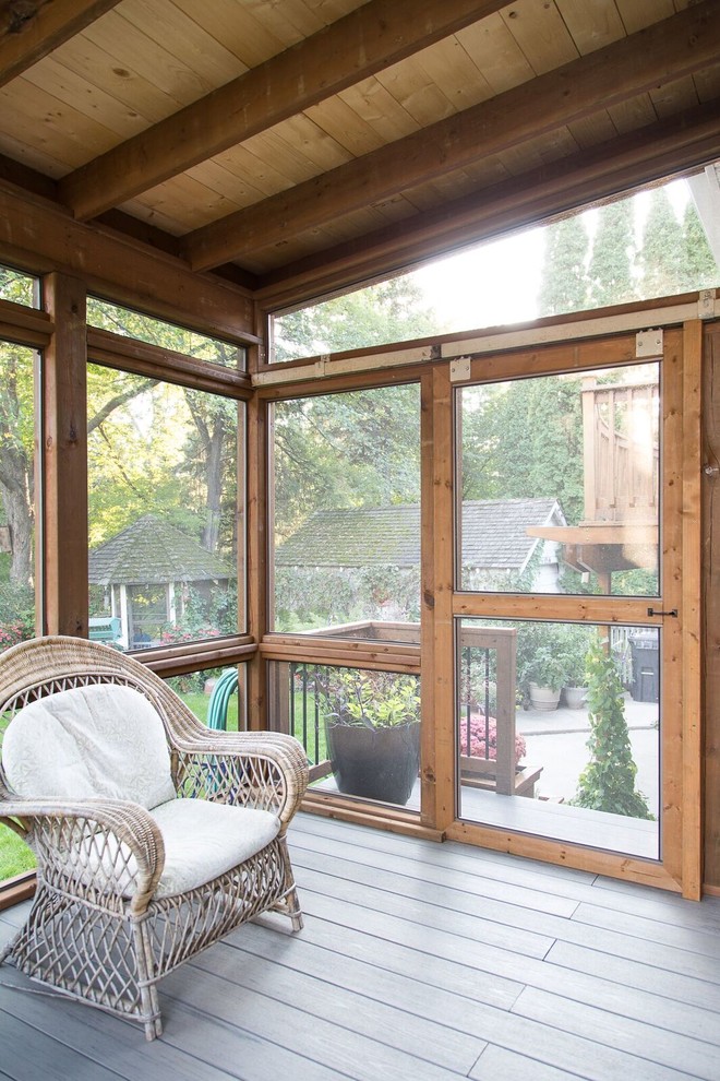Deck - mid-sized transitional backyard deck idea with a roof extension