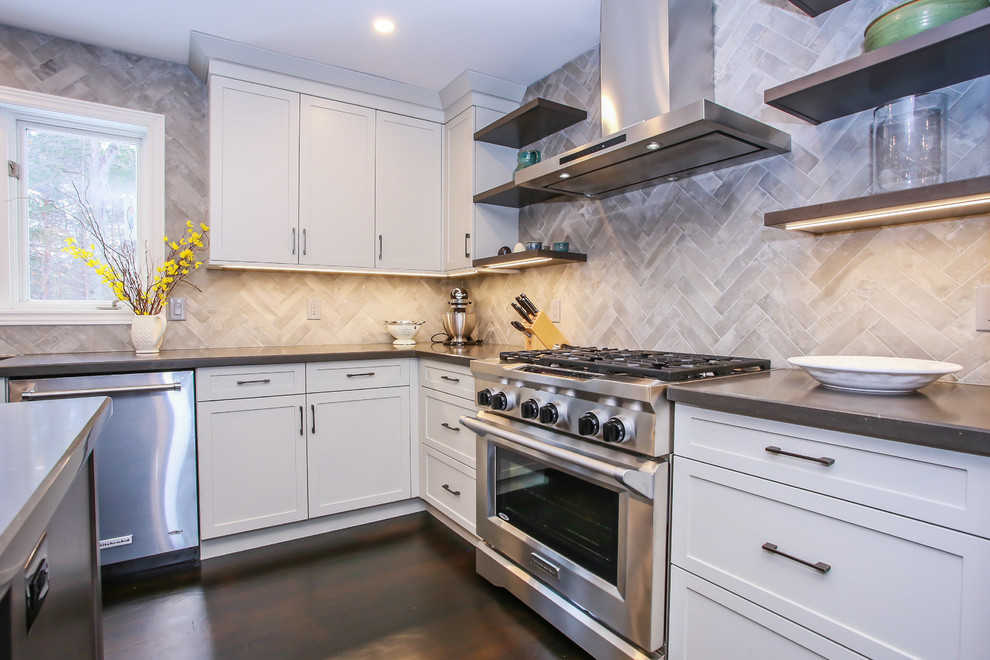 Eat-in kitchen - large transitional l-shaped dark wood floor and brown floor eat-in kitchen idea in Toronto with an undermount sink, shaker cabinets, gray cabinets, quartz countertops, gray backsplash, porcelain backsplash, stainless steel appliances and an island