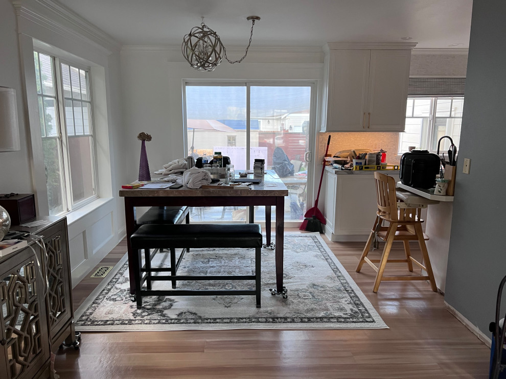 I can’t center dining table on area rug. Rug or no rug?
