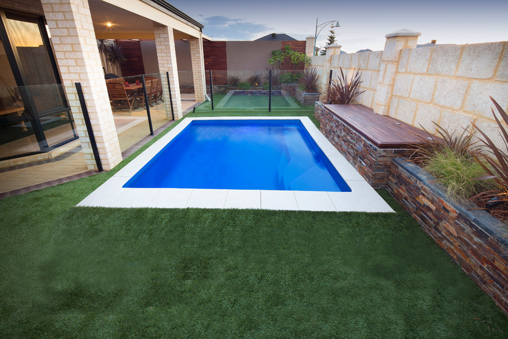 Design ideas for a small modern courtyard rectangular pool in Perth.