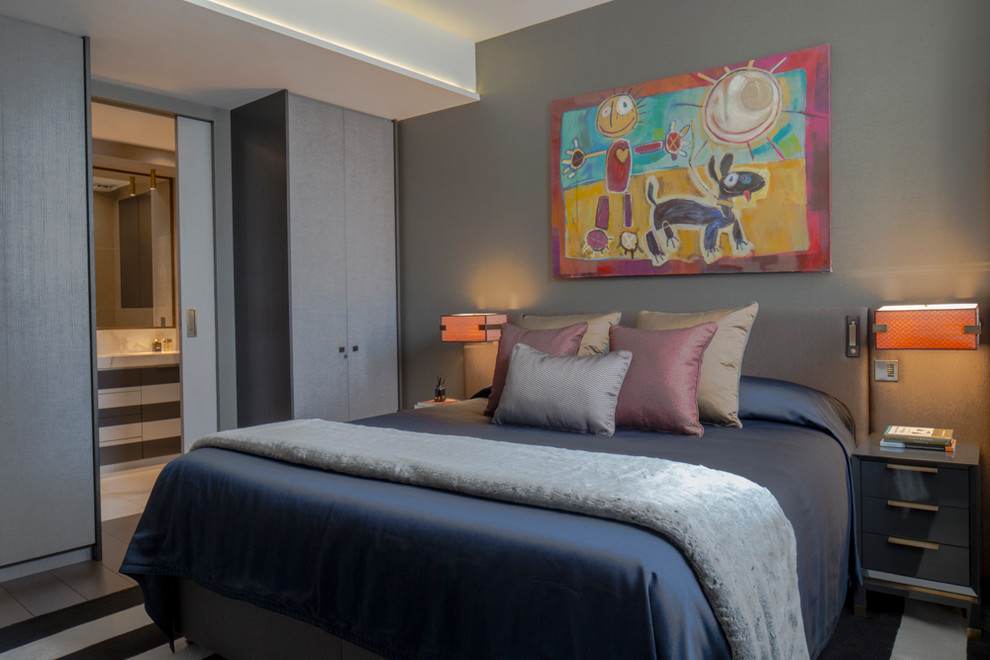 Bedroom - mid-sized modern gray floor bedroom idea in London with gray walls and no fireplace