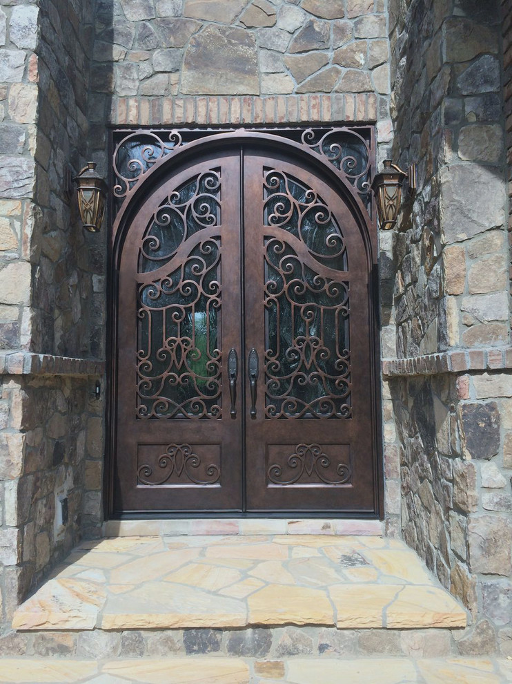 Large front door in Charlotte with a double front door and a brown front door.