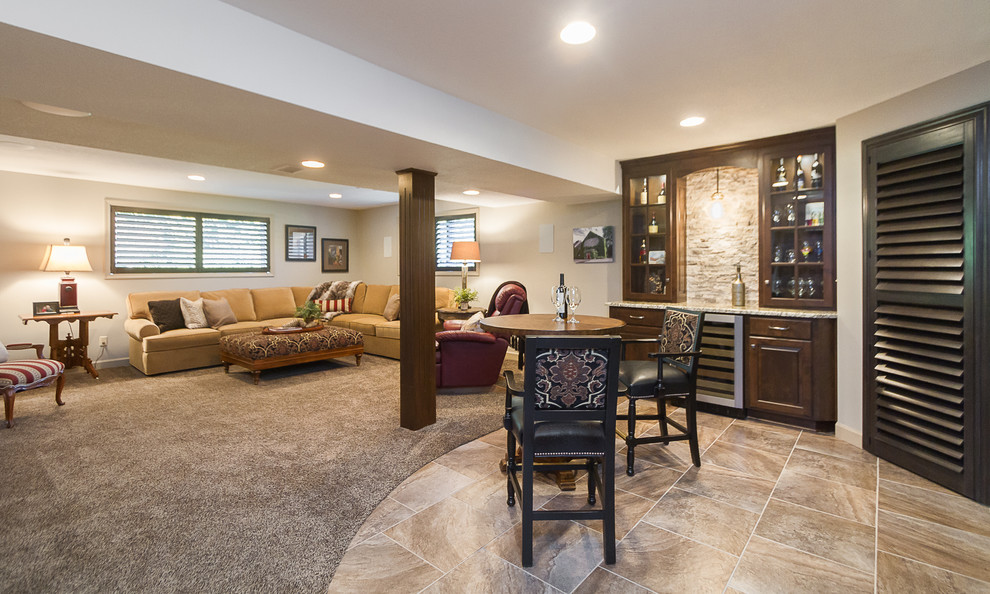 Mid-sized transitional look-out basement in Kansas City with black walls, carpet, beige floor and no fireplace.