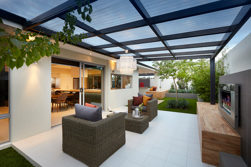 Design ideas for a contemporary patio in Perth with a fire feature and a pergola.