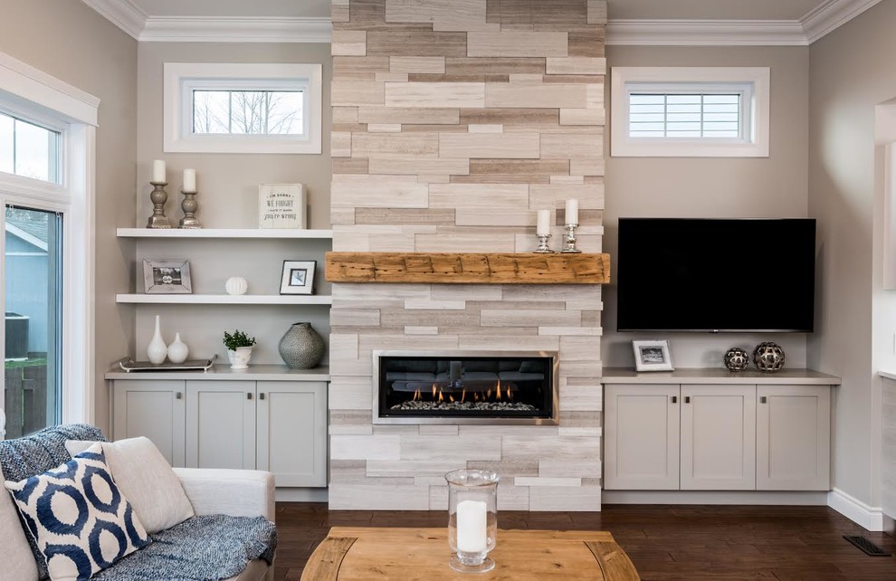 Inspiration for a mid-sized contemporary formal enclosed living room in Toronto with dark hardwood floors, a ribbon fireplace, a stone fireplace surround, a wall-mounted tv and grey walls.