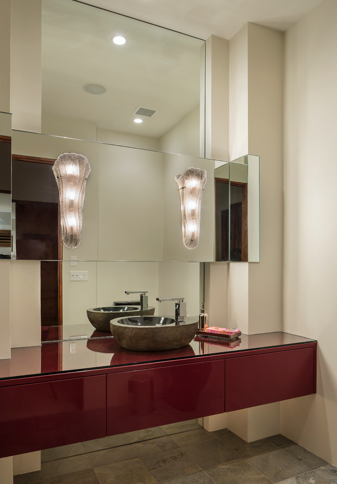 Photo of a contemporary powder room in Phoenix with a vessel sink.