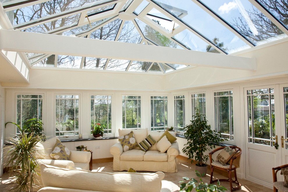 Photo of a traditional sunroom in Cornwall with no fireplace and a glass ceiling.