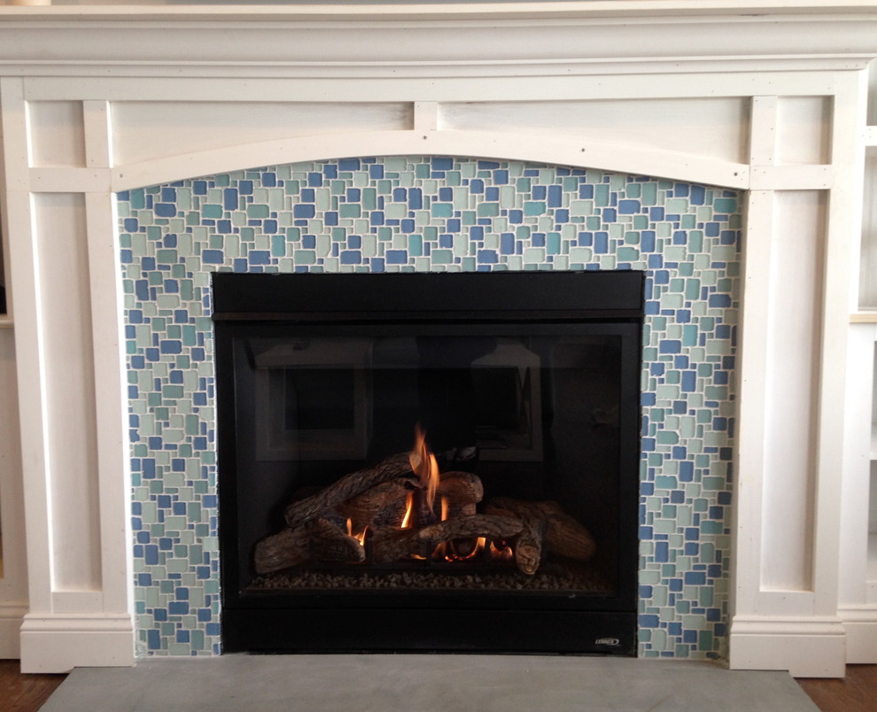 Inspiration for a mid-sized beach style family room in New York with a standard fireplace and a tile fireplace surround.