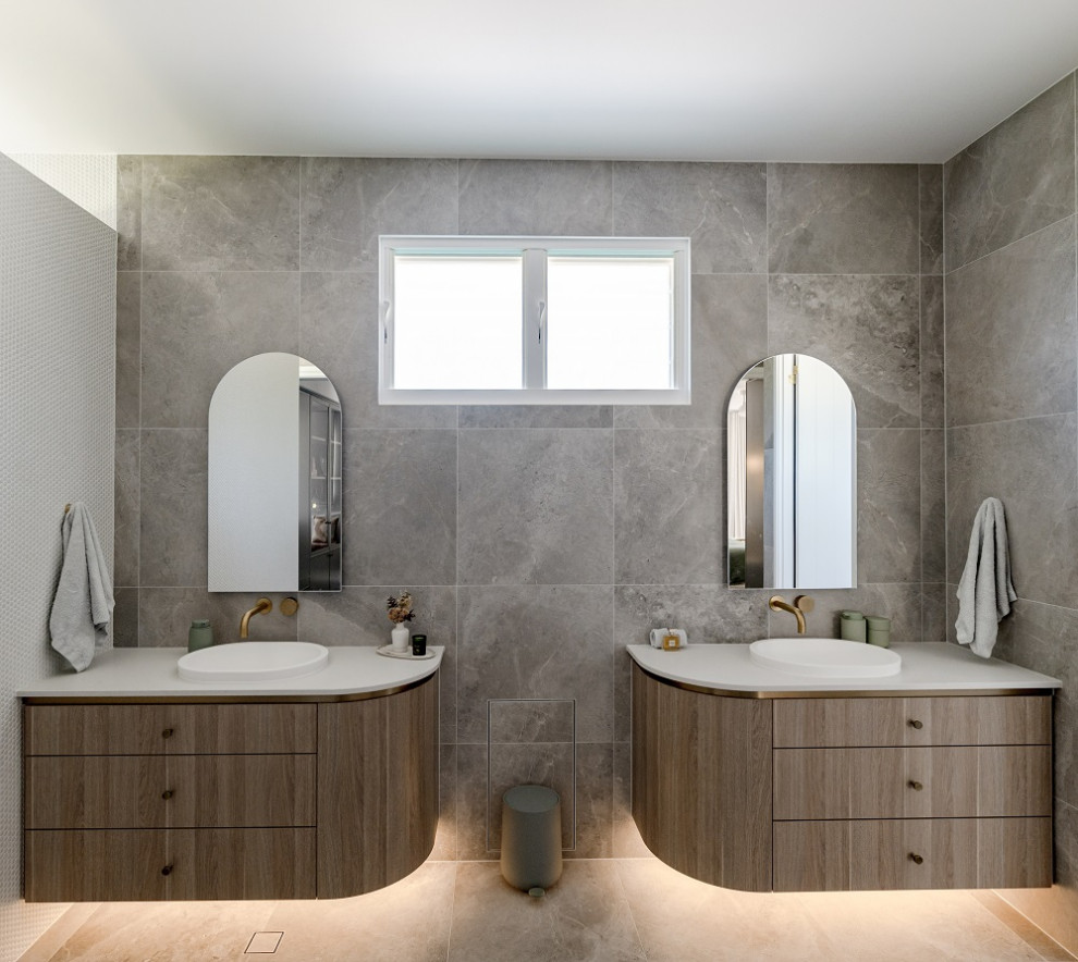 This is an example of a large contemporary master bathroom in Sunshine Coast with ceramic floors, a drop-in sink, engineered quartz benchtops, an open shower and a floating vanity.