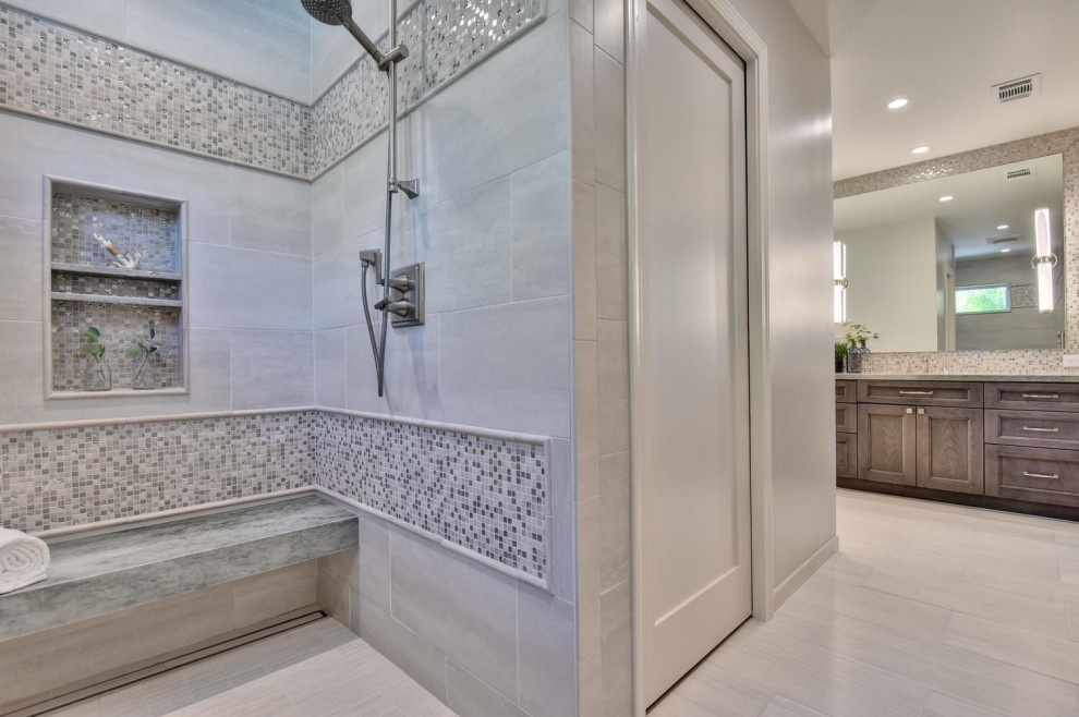 This is an example of a mid-sized contemporary master bathroom in San Francisco with shaker cabinets, dark wood cabinets, a corner shower, a one-piece toilet, gray tile, glass sheet wall, grey walls, cement tiles, an undermount sink, quartzite benchtops, grey floor, an open shower and orange benchtops.