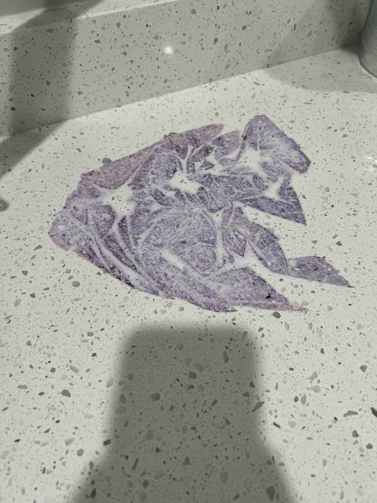 Any tips on how to remove purple primer stain from quartz countertop?