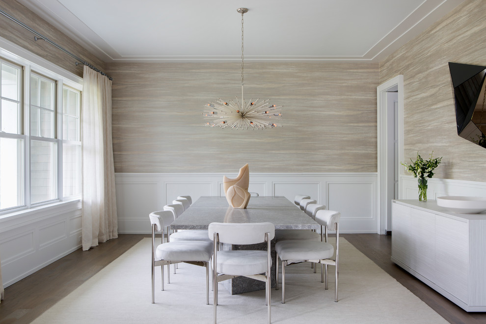 Design ideas for a transitional separate dining room in New York with beige walls, no fireplace and medium hardwood floors.