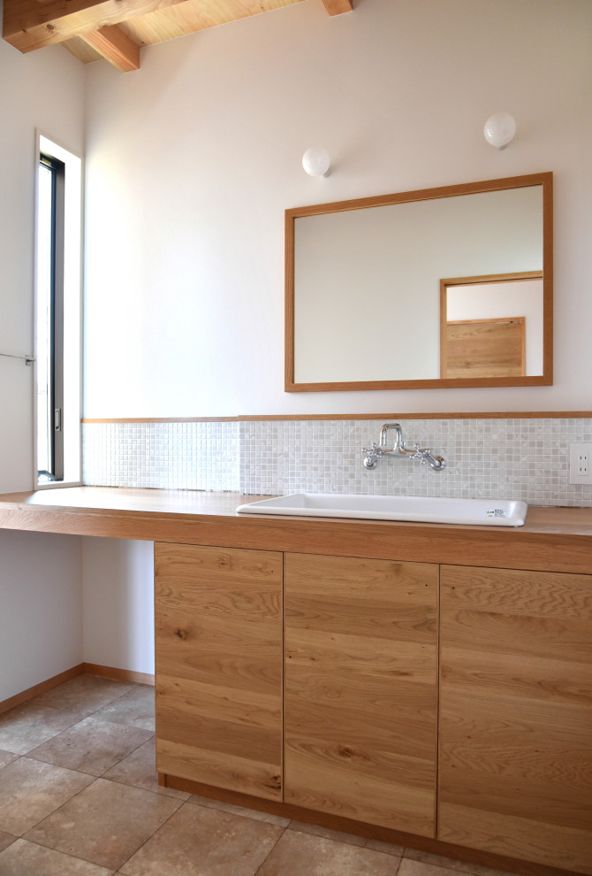 This is an example of a medium sized scandi cloakroom in Other with flat-panel cabinets, dark wood cabinets, mosaic tiles, medium hardwood flooring, wooden worktops, a built in vanity unit and exposed beams.