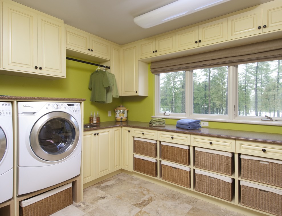 Inspiration for a traditional laundry room in Ottawa with green walls.