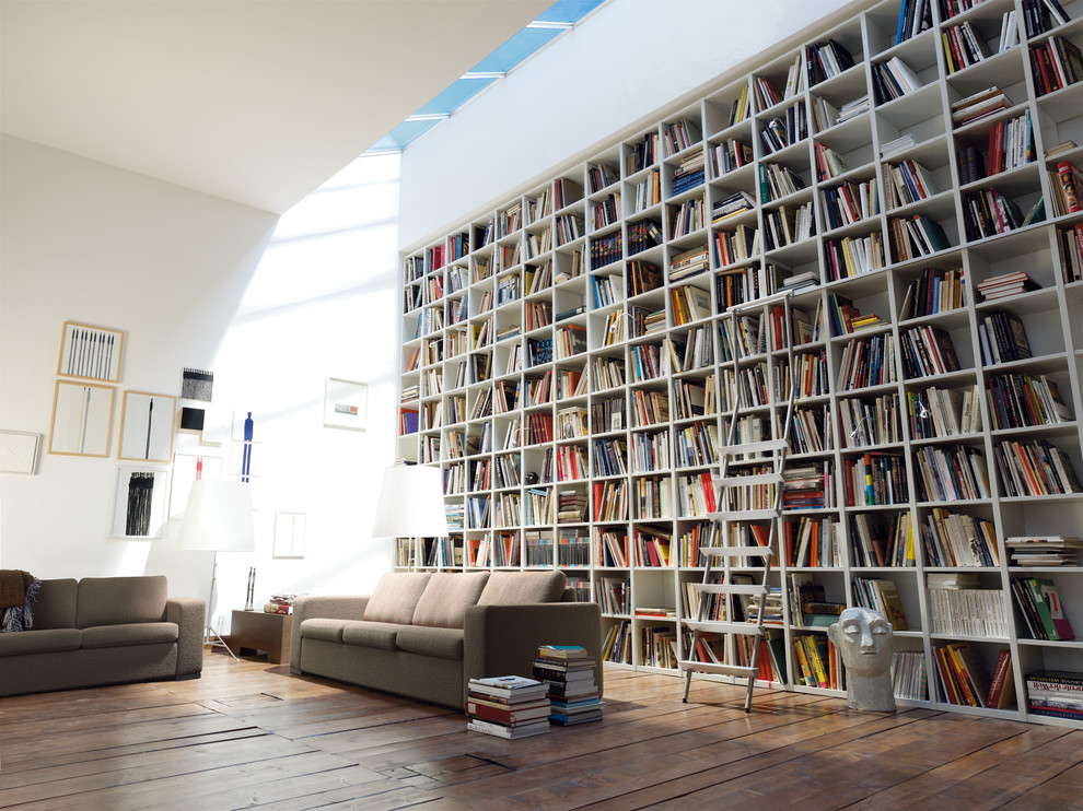 Design ideas for a large contemporary loft-style living room in Dusseldorf with a library, white walls, painted wood floors, a wood stove, no tv and brown floor.