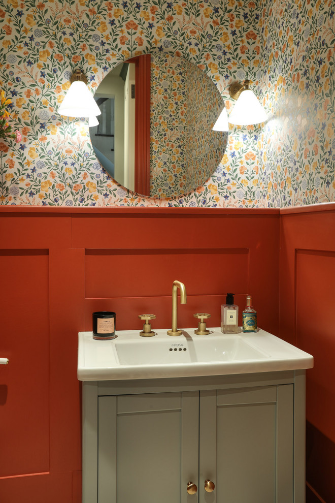 Design ideas for a transitional powder room in London.